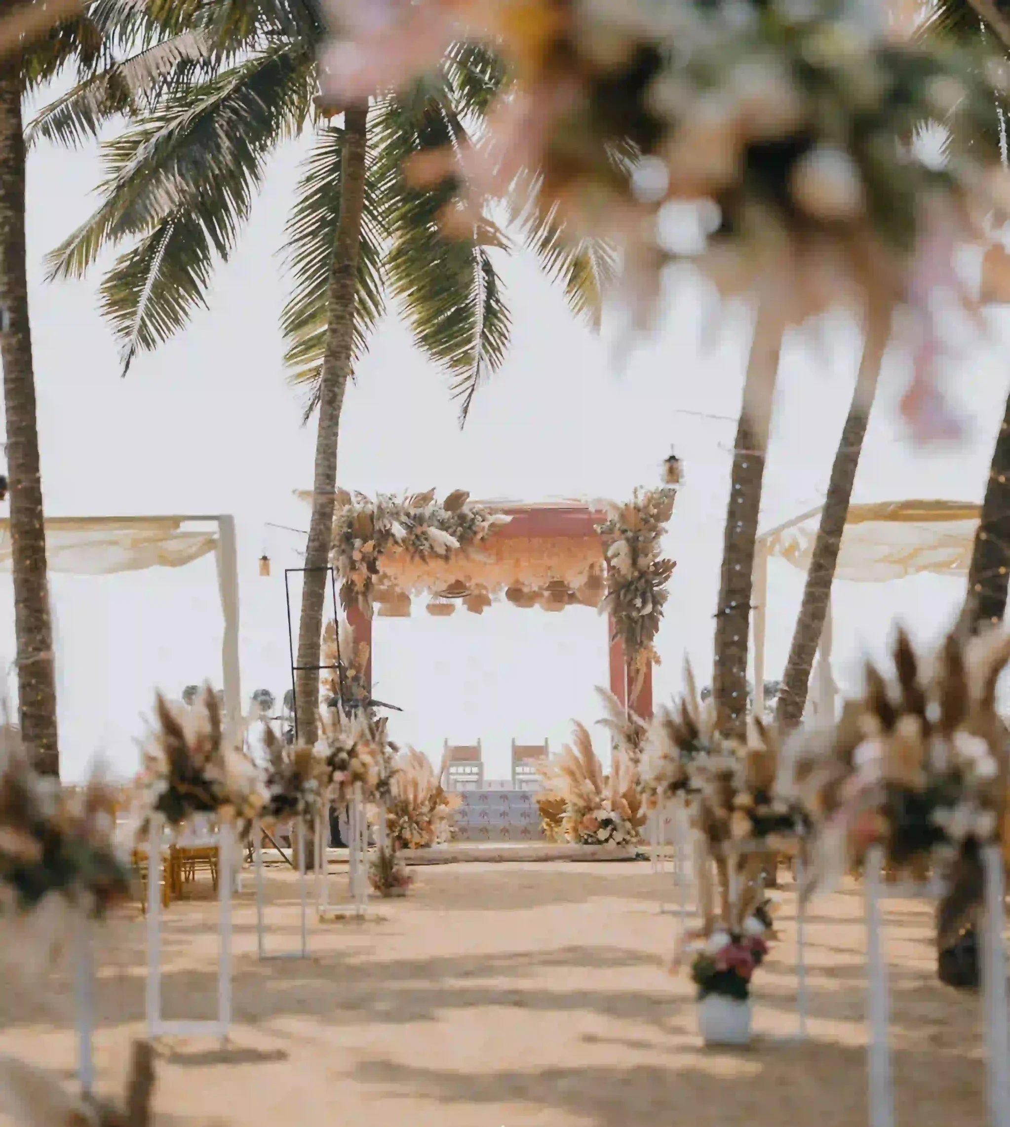 A custom-designed beachside stage, set against the backwater views and styled for a North-South fusion celebration.