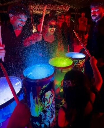 Vibrant water drum and DJ party entertainment at the Ammachi Veed intercaste wedding