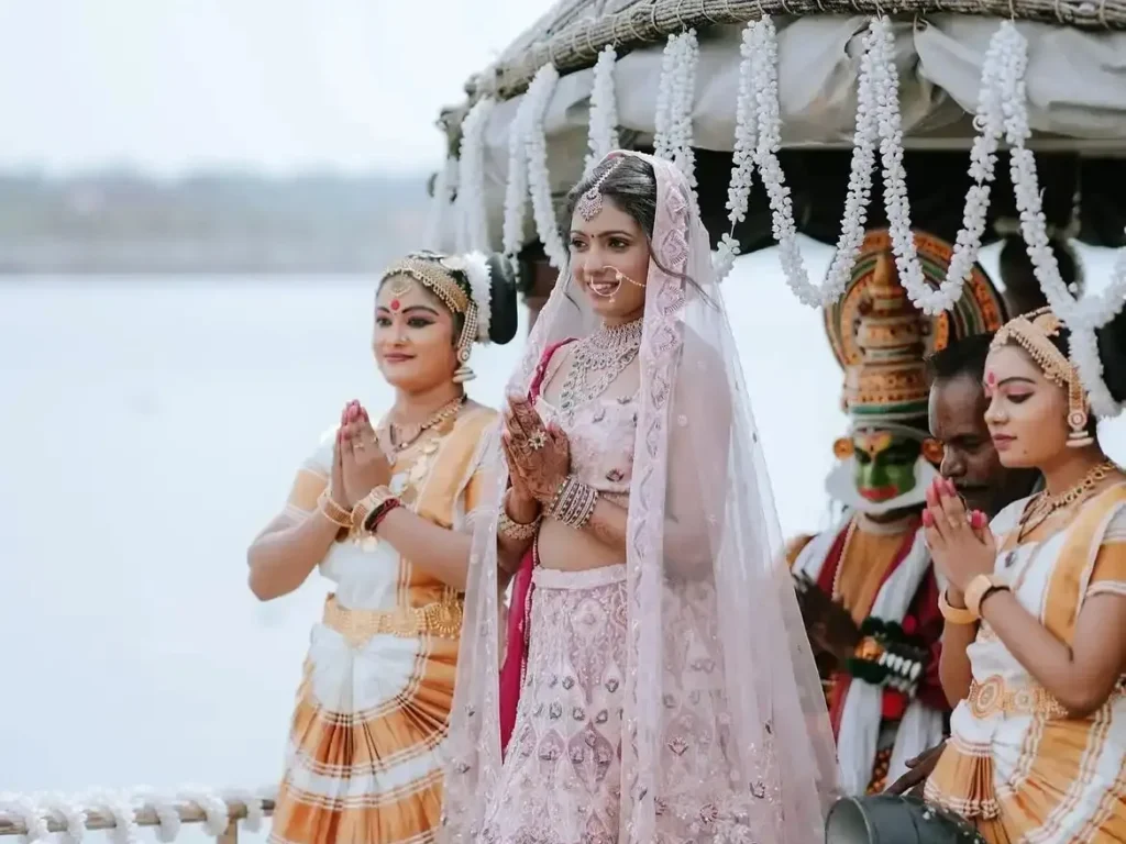 Bride and groom during a backwater wedding ceremony in Kerala, arranged by kerala wedding planners Melodia Event Management