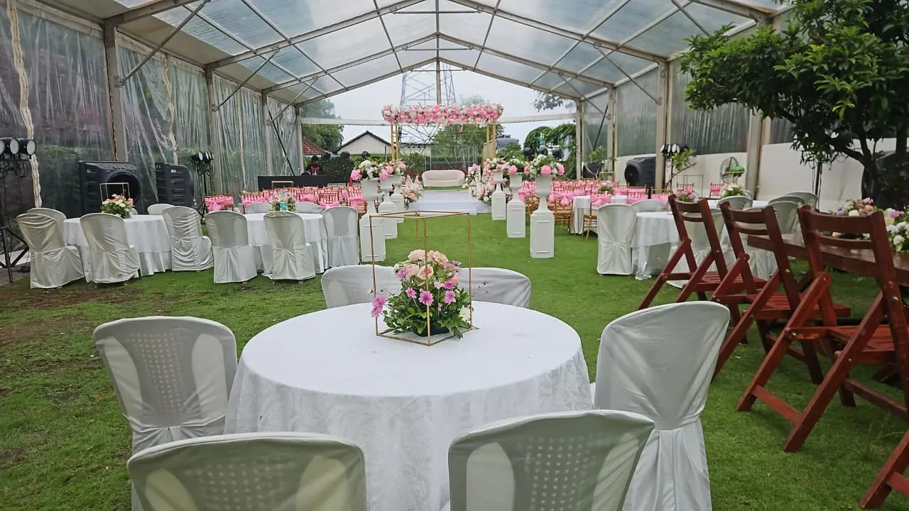 how to choose an event venue - professional wedding stage setup with floral decor and seating in Kerala