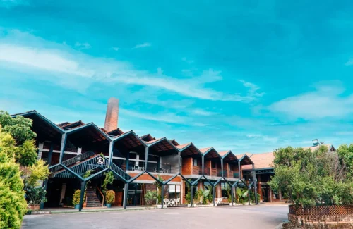 Grand heritage exterior architecture and premium brick facade of K-Hills Resort and Spa in Ramanattukara Calicut.