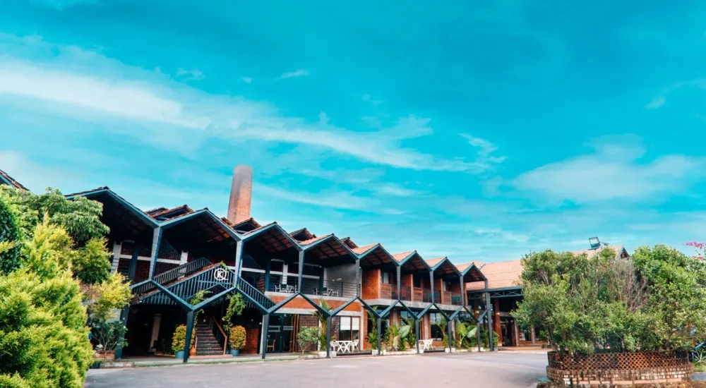 Grand heritage exterior architecture and premium brick facade of K-Hills Resort and Spa in Ramanattukara Calicut.