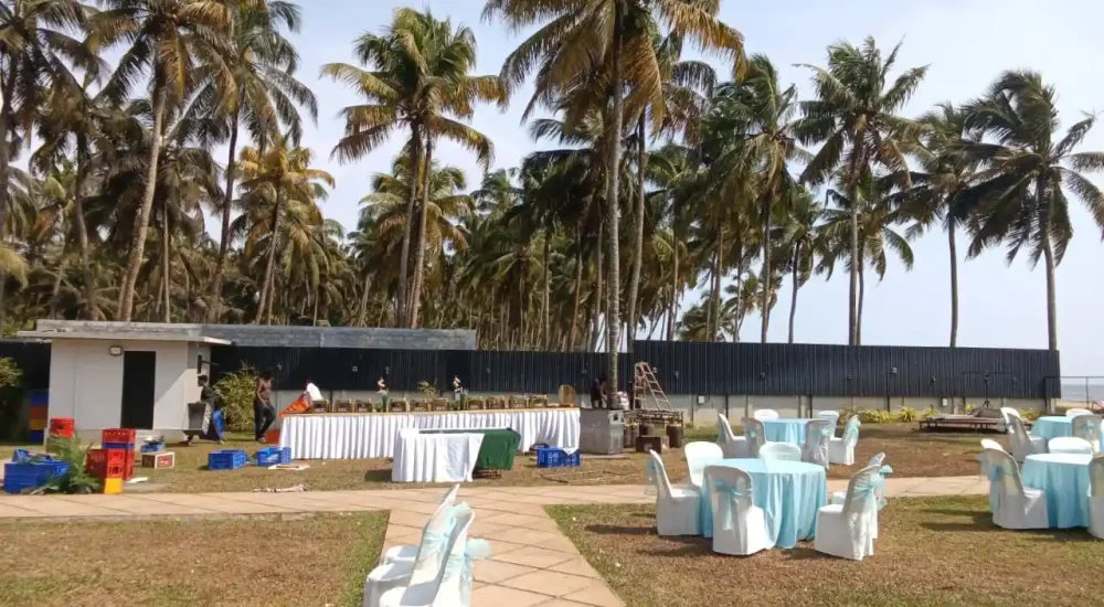 Outdoor dining and buffet area prepared for a beachside celebration at Deja Blu.