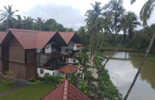 Arcadia Resort & Banquet ,Veranda and paved walkway at Arcadia Resort Guruvayoor.