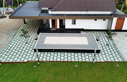 Aerial view of the $10\text{m} \times 5\text{m}$ built-in outdoor stage and main building at Coconut Groves venue