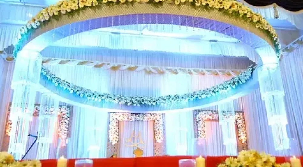 Modern staging and lighting setup inside the centralized air conditioned premium banquet hall